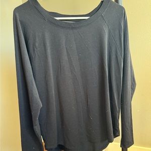 Athleta size medium long sleeve with a mesh detail on back
